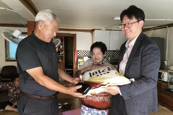 수원시 권선구 서둔동 마을만들기협의회, 추석명절 백미 전달