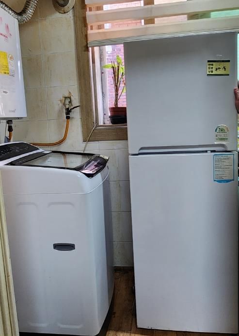 수원시 팔달구 우만1동, 통합사례관리 가구에 세탁기·냉장고 지원으로 사랑나눔 실천